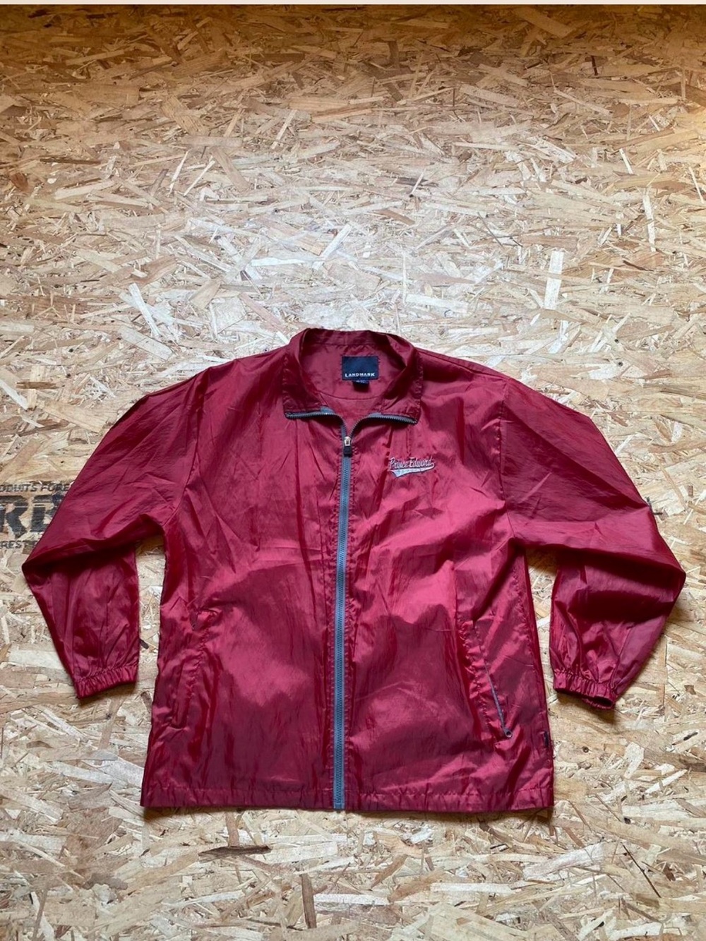 Classic Red Windbreaker Jacket by Landmark-Prince Edward Island